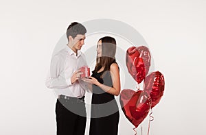 Couple with balloons in Valentine Day
