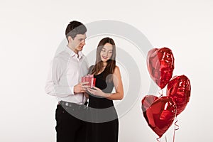 Couple with balloons in Valentine Day