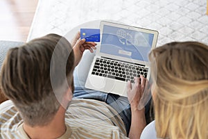 Couple banking online from home