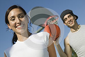 Couple at Basketball Court low angle view.