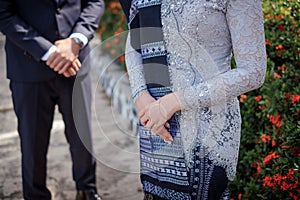 Couple with Batak ulos cloth at Batak tribe engagement