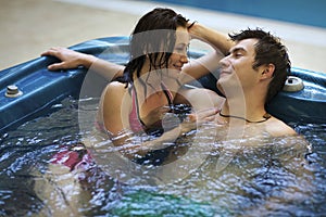 Couple bathing at jacuzzi