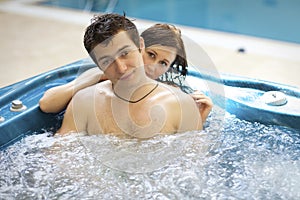Couple bathing at jacuzzi