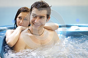 Couple bathing at jacuzzi