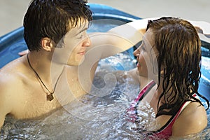 Couple bathing at jacuzzi