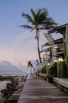 Couple on the beach of Curacao during sunset