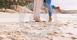 Couple, beach and feet in sand outdoor for love while romantic, happy and together on vacation or holiday. Relax man and