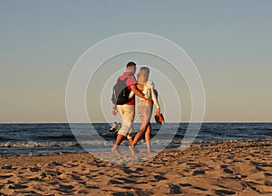 Couple during a beach stroll #2