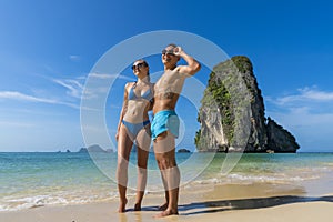 .Couple on beach summer vacation, young people happy smiling  on a tropical beach Krabi, Thailand