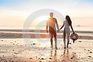 Couple On Beach At Sunset Summer Vacation, Beautiful Young People In Love Walking, Man Woman Holding Hands