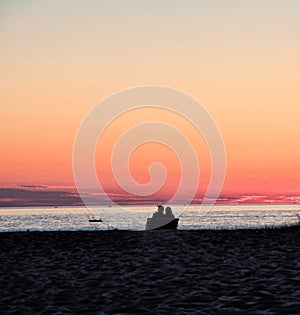 Couple at Beach Watching Sunset