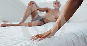 Couple, bed and hands on duvet for love, romance or intimacy in affection, morning or seduction at home. Closeup of