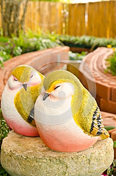 Couple of bird statue in garden