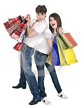 Couple in blue jeans shopping.