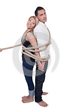 Couple bound together by a rope