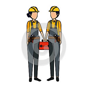 couple builders workers with helmets