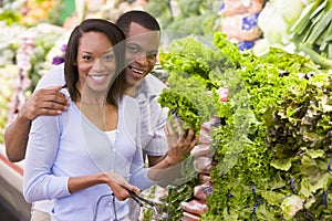 Couple buying fresh produce