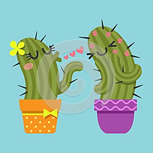 Couple of cactus blowing kiss