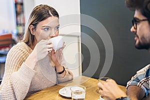 Couple in cafe enjoying the time spending with each other