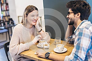 Couple in cafe enjoying the time spending with each other