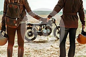 Couple and cafe racer motorcycle