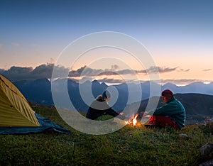 Couple camping at night