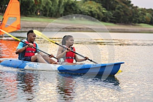 Couple canoeing in a lake