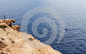 Couple canoeing in the Lampedusa sea