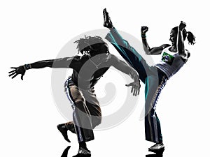 Couple capoiera dancers dancing silhouette