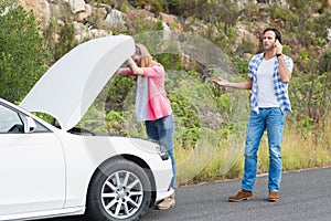 Couple after a car breakdown