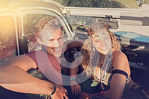 Couple in a car at sunset