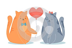 Couple cats in love. Cat gives his beloved balloon in form of heart.