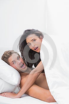 Couple caught in the act in bed