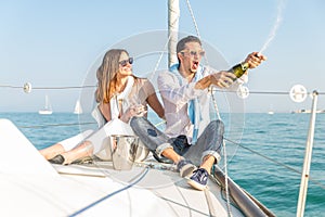 Couple celebrating on the boat