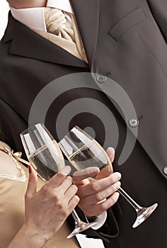 Couple celebrating with champagne, toasting