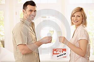 Couple celebrating new house