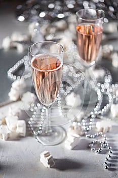 A couple celebrating with sparkling rose wine
