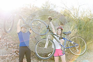 Couple Celebrating Success With Bicycles