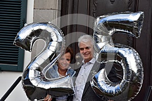 Couple celebrating their 25th marriage anniversary
