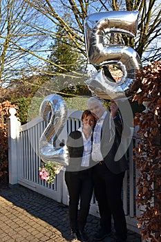 Couple celebrating their 25th marriage anniversary