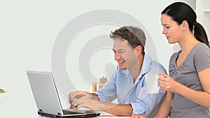 Couple chatting on the laptop