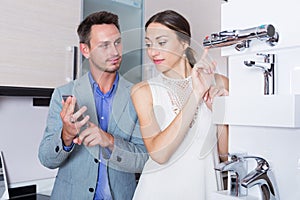 Couple choosing new mixer tap