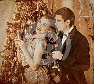 Couple on Christmas party.Sepia toned.