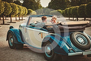 Couple in a classic car