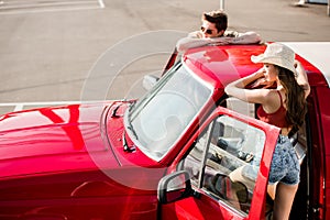 Couple with classical car