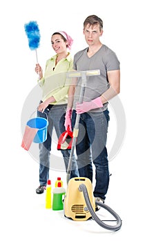 Couple cleaning the house