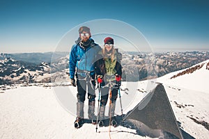Couple climbers Man and Woman reached Elbrus mountain summit