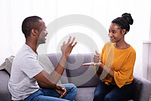 Couple Communicating With Sign Languages