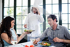 Couple complaining about the food to chef