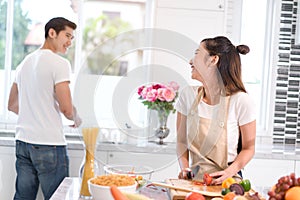 Couple cooking food in kitchen room, Young Asian man and woman together